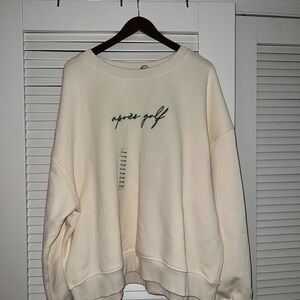 Le Lis Cream Top with Green Detail “apres golf”